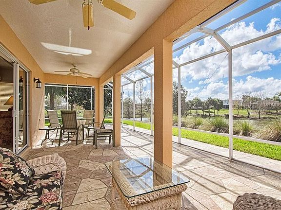 Covered extended Patio birdcage for all weather enjoyment.