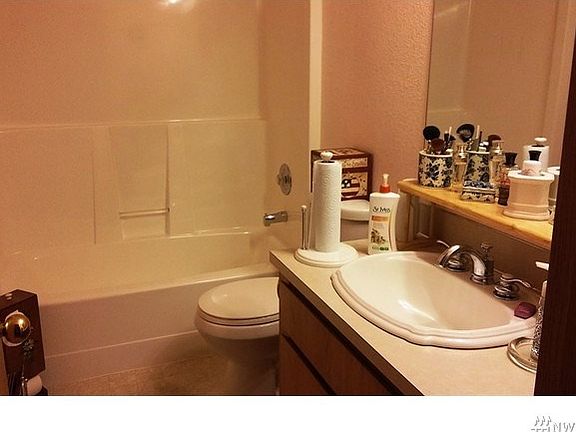 Main Hall Bath across from bedroom 2 & 3.