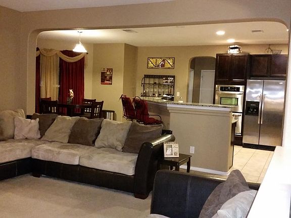 Open floor plan from living/family room to kitchen.
