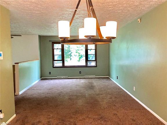 Entertainment Abounds in this 22' x 15' Living Room - Dining Room Open concept! Lets in plenty of natural light from front to ba