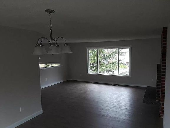 Spacious Living Room with Laminate Flooring