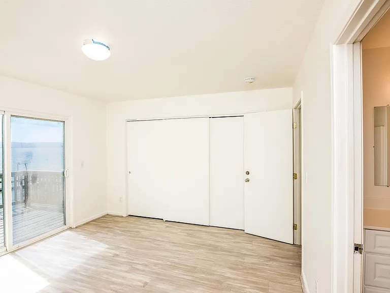 2nd floor bedroom (#3) with private deck