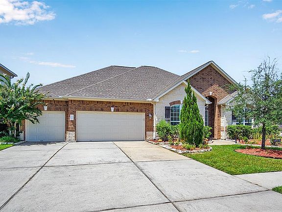 In-ground sprinkler system and beautifully landscaped yard