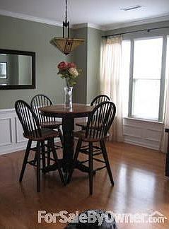 Dining Room : Wainscoting and triple window. Use for dining, study, 2nd den, lots of room!