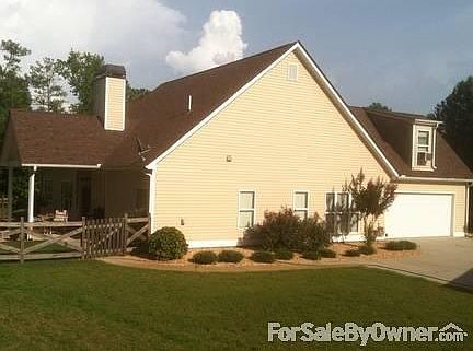 Side yard
						:
						West. Fenced back yard.