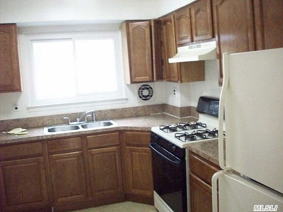 4th image of 11541 Farmers Blvd