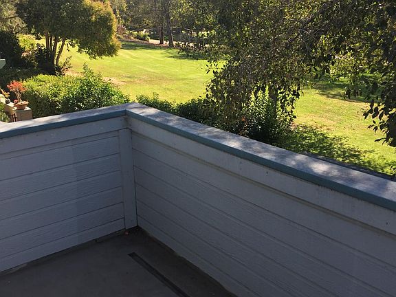 Second floor balcony and view of park.