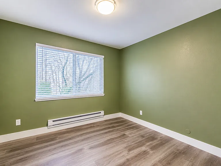 The second bedroom also has a peaceful feel as it backs onto the tranquility of the greenbelt. It is so quiet; I can imagine a rainstorm, a lil lavender, and lights out for the night.