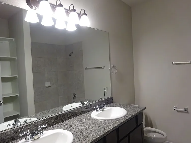 Ensuite bathroom connected to primary bedroom