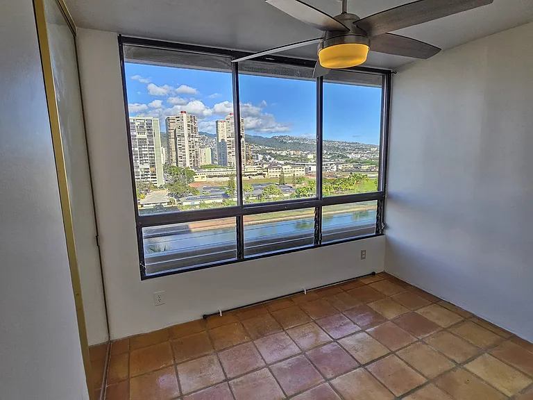 Master bedroom with relaxing mountain and Ala wai cancal views