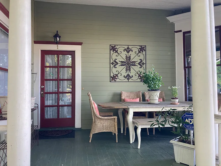 Front door and porch off kitchen