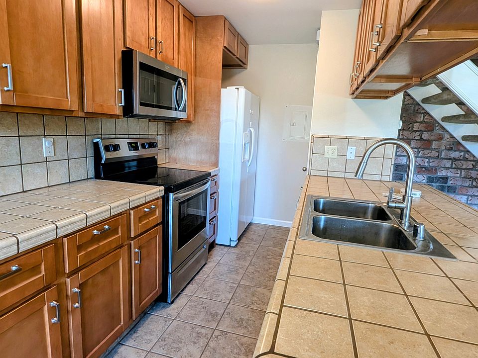 Lots of workspace in the kitchen and a lovely pass-through bar is part of the open floorplan.