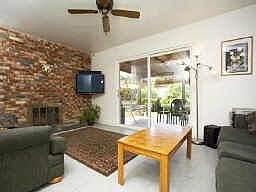 Family Room with fireplace and views.