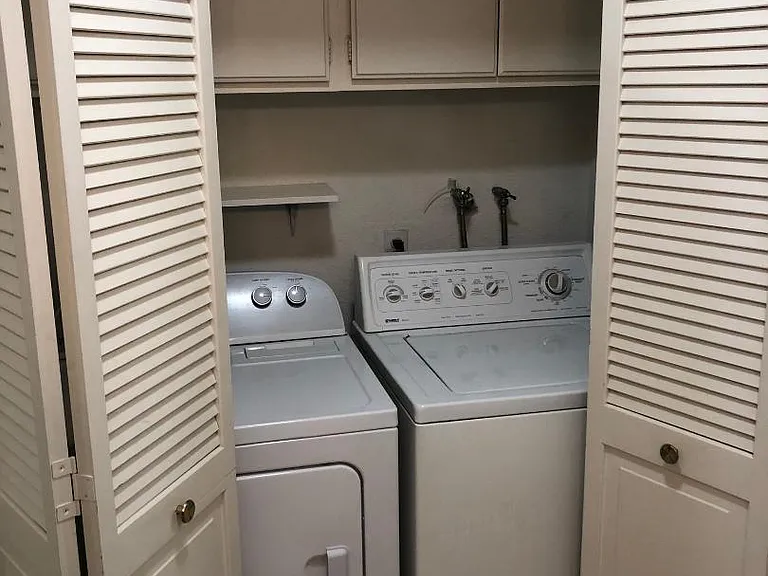 Partially hidden washer dryer