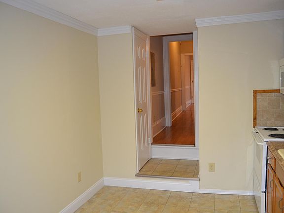Step down into the tiled kitchen