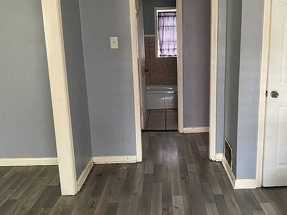 dining room view to hallway and bathroom