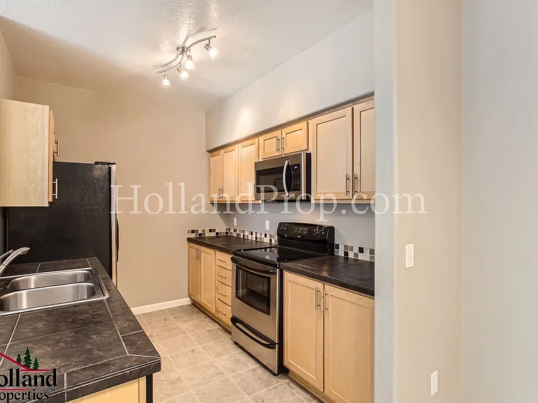11845 NW Stone Mountain Ln #303 — Photo 6