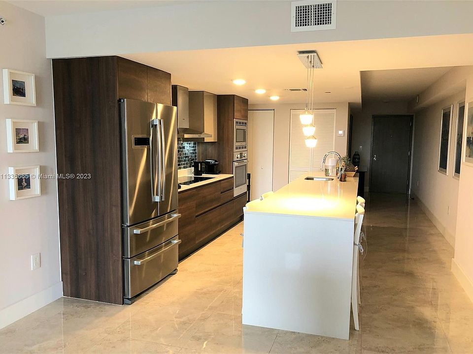 1st image of 9261 E Bay Harbor Dr Unit 404