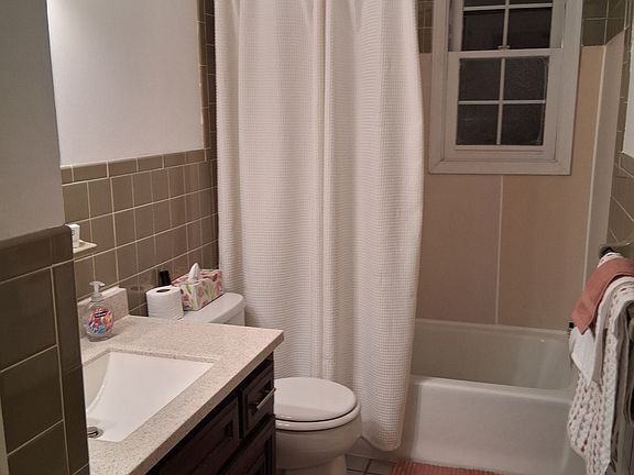Full bath with linen closet