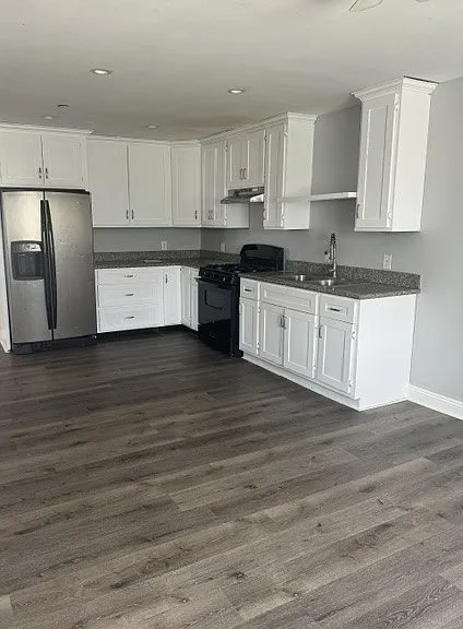 9409 S San Pedro St — Photo 3