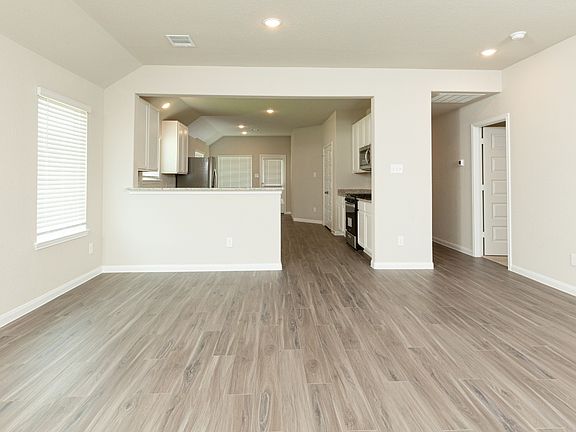 Family Room to Kitchen and Dining Area