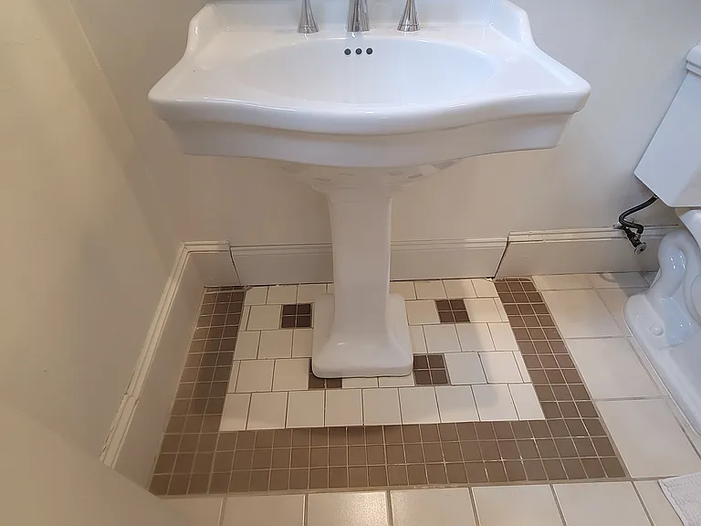 Ceramic tile bath with window facing South . Natural light all day.