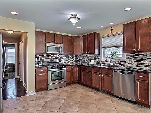 ANOTHER VIEW OF THE KITCHEN