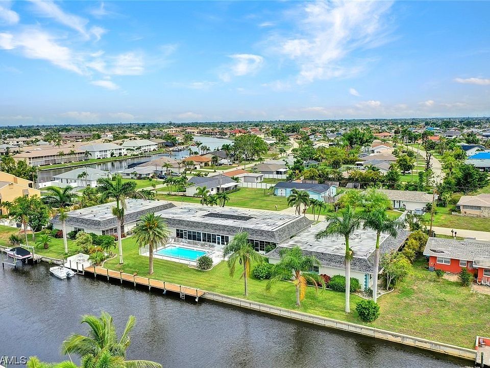 Aerial view of the property showing that it is a small, 3 building complex