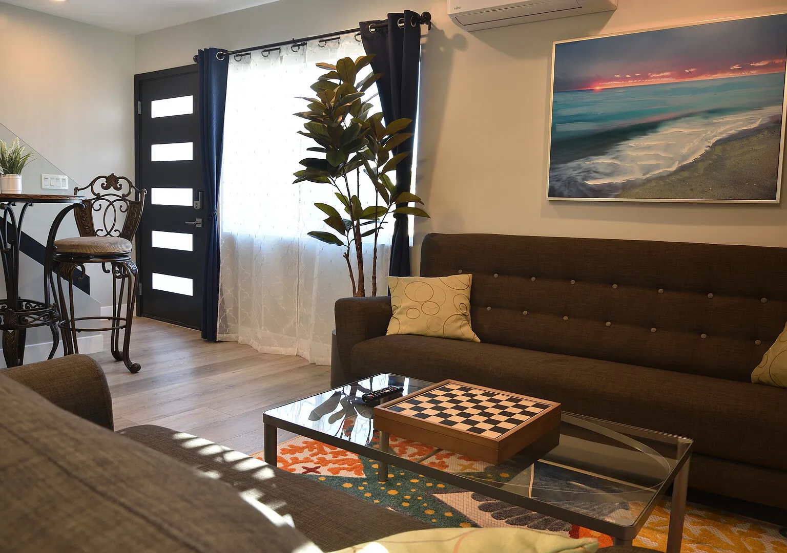 Ocean Breeze Retreat: 2BR/2BA Oasis with Rooftop — Photo 1