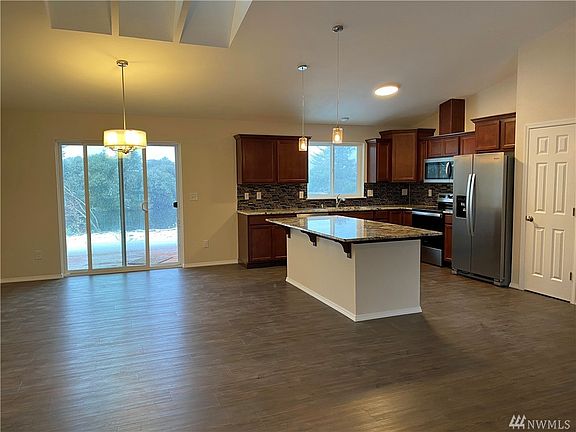 Dining and kitchen both with views of the canal. Picture as of 01/14/2020