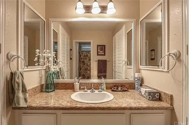 This bathroom is shared between 2 rooms. It is a full size bathroom.