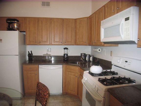 Eat-in Kitchen with Newer Maple Cabinets...