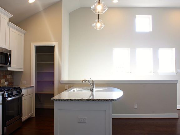 Spacious kitchen with natural lighting