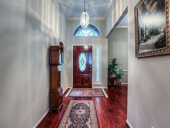 Hand scrapped hard wood floors give this home an impressive 'new construction' feel.