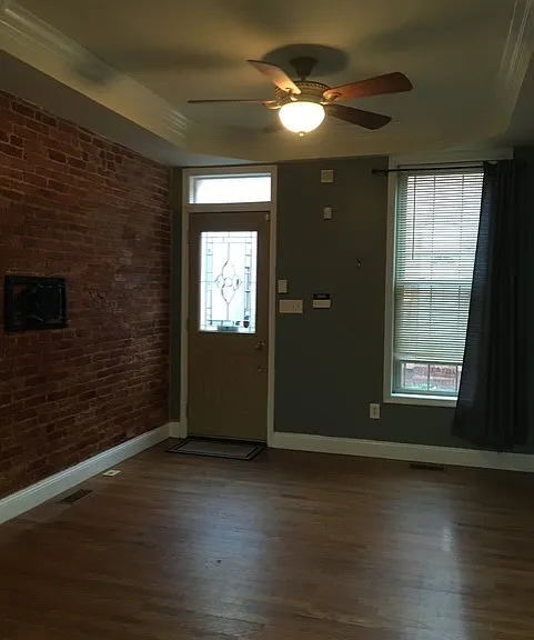 Living room with exposed brick