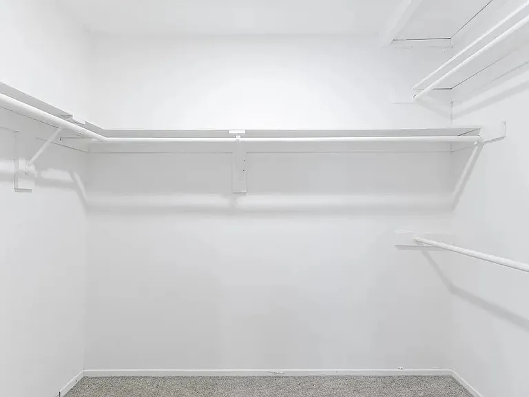 walk in closet in bedroom