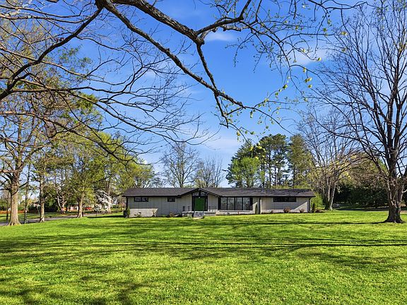 1 acre level yard with swimming pool