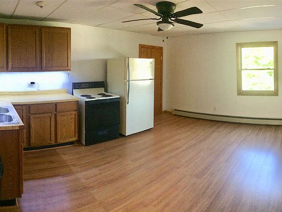 Kitchen looking toward entrance door and front window