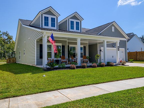 Front View with Easement on all three sides of the property. Not close to your neighbors!
