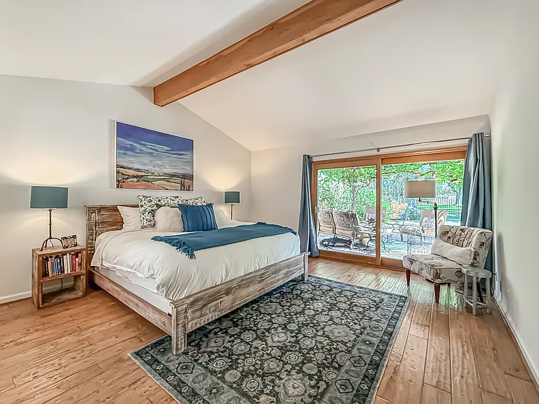 Primary bedroom opens to outdoor living area
