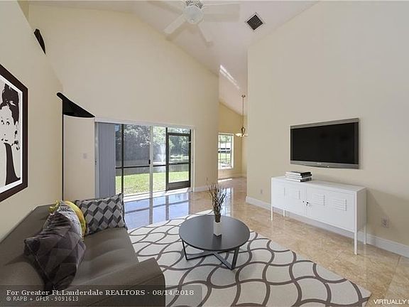 Great room overlooking the backyard pond.