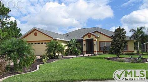BEAUTIFUL CURB APPEAL! Professionally landscaped and maintained.