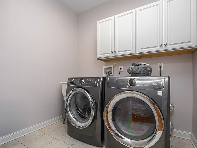 Laundry Room with a closet and sink