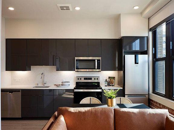 Thoughtful touches like undercabinet lighting, high gloss cabinets, oversized windows and roller shades combine to create an excellent living experience at Modera Berkeley.*