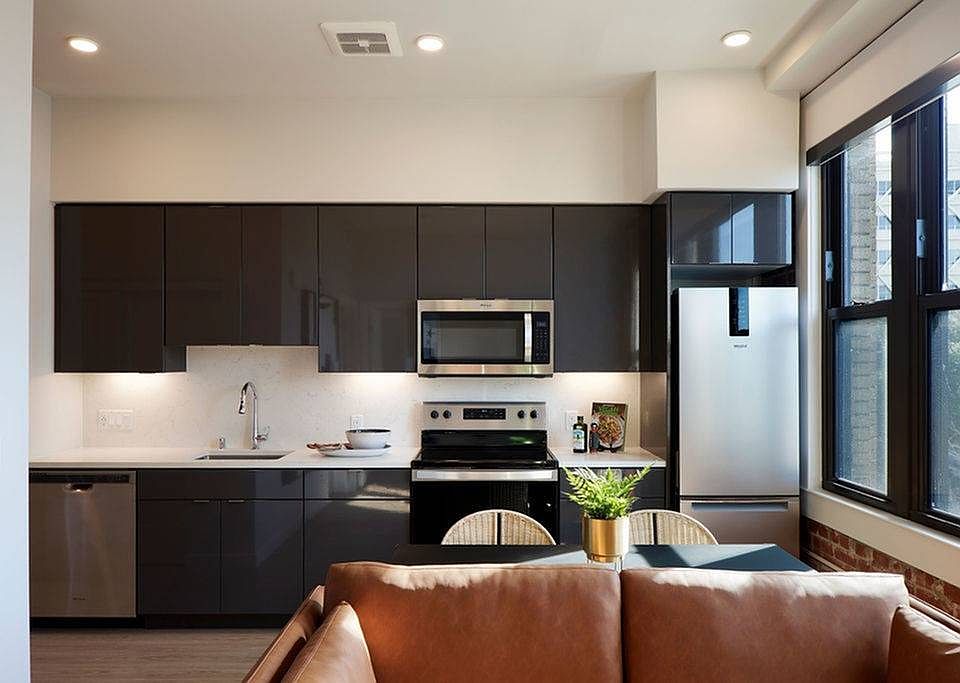 Thoughtful touches like undercabinet lighting, high gloss cabinets, oversized windows and roller shades combine to create an excellent living experience at Modera Berkeley.*