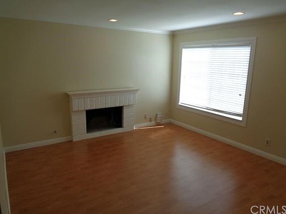 Living Room with Wood Burning Fireplace
