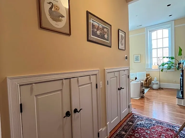 First set of double doors contains washer and dryer. Second set of double doors goes to storage area.