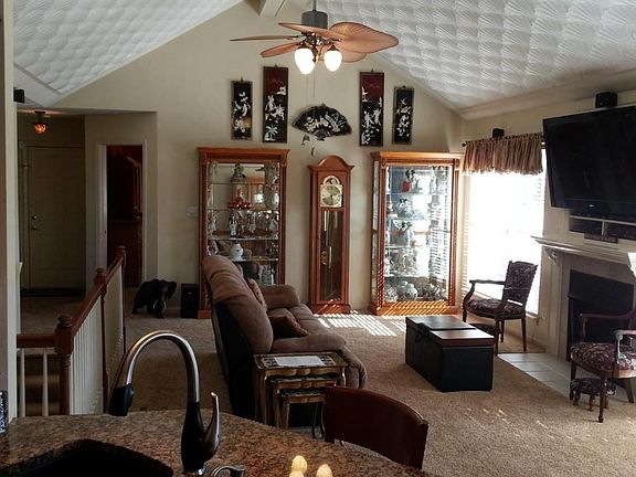 Vaulted Great Room w/ Fireplace and View