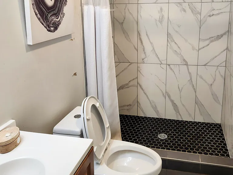 Lovely new tile shower downstairs