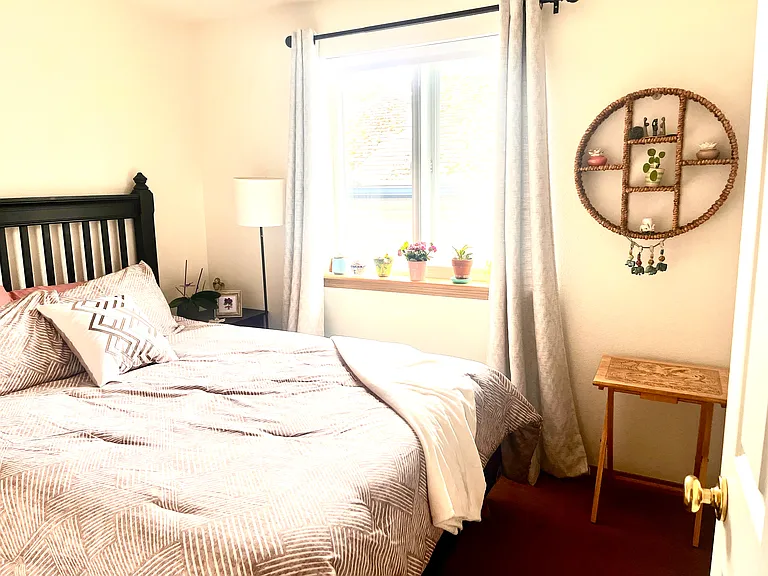 Bright Second Bedroom: A sunlit, comfortable bedroom featuring great natural light. For ultimate convenience, the full hallway bathroom is located just steps away.